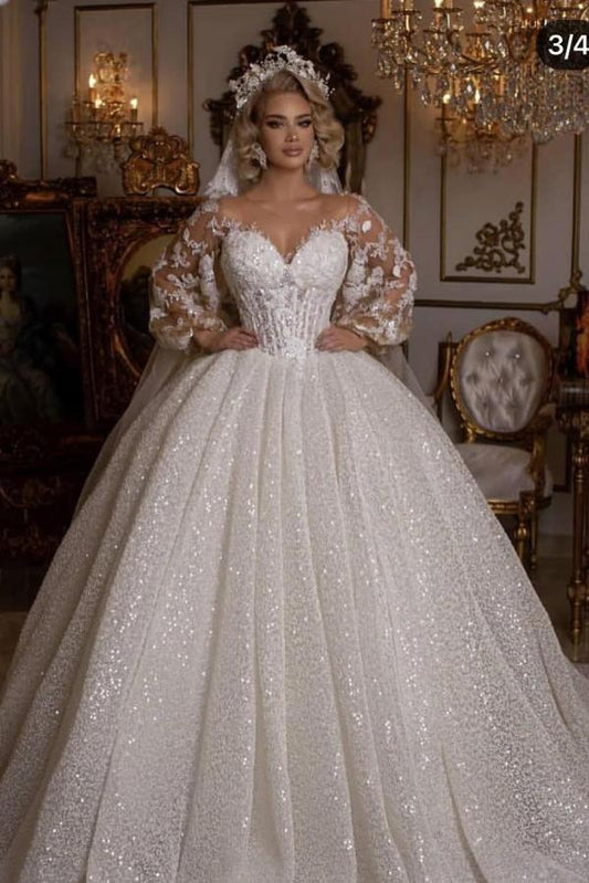 Elegant Ball Gown Wedding Dress Featuring Long Puffy Sleeves and Appliques