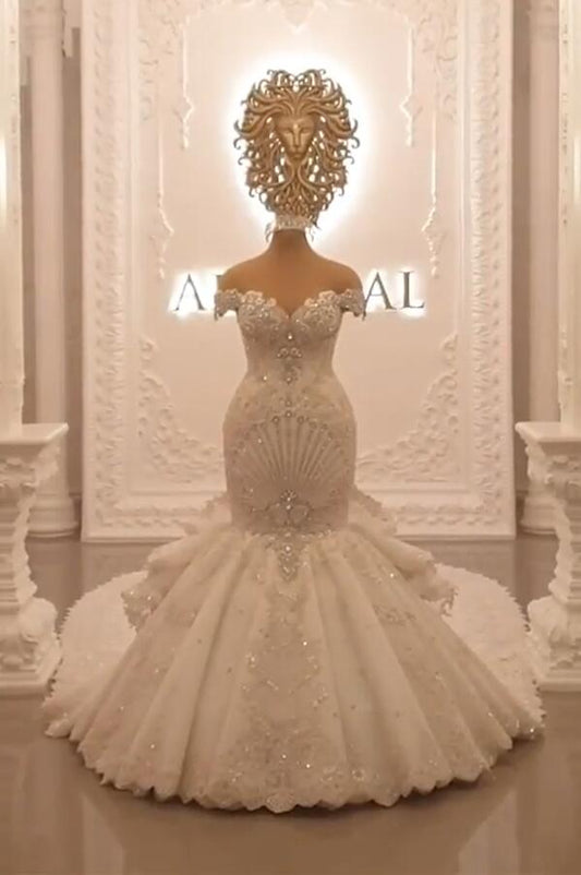 Elegant Off-The-Shoulder Mermaid Wedding Dress with Crystal Details and Backless Design