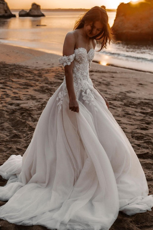 Elegant Off-the-shoulder A-Line Wedding Dress with Lace Appliques and Tulle Train
