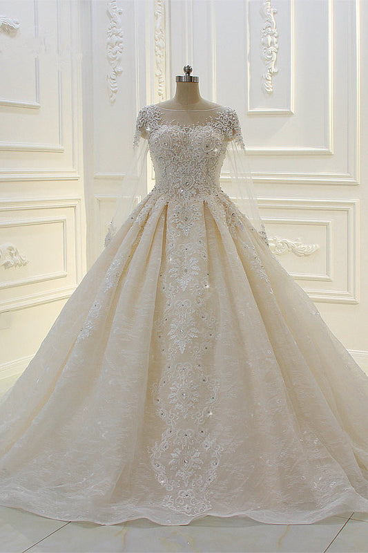 Elegant Beaded Bateau Ball Gown Wedding Dress with Lace Appliques and Long Sleeves