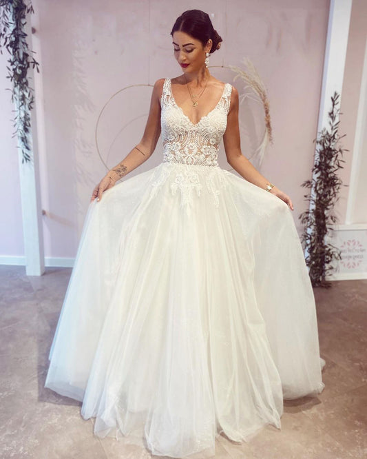 Elegant Backless A-Line Wedding Dress with Deep V-Neck and Lace Appliques
