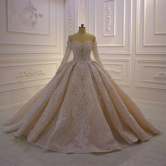 Elegant Off-The-Shoulder Ball Gown Wedding Dress with Lace Appliques and Long Sleeves