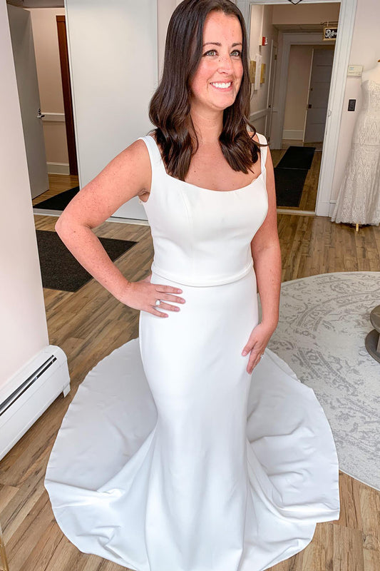 Elegant Mermaid Wedding Gown with Spaghetti Straps and Satin Open Back