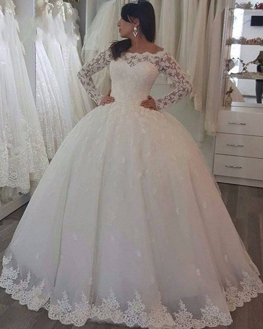 Elegant Off-the-Shoulder Wedding Gown with Long Sleeves and Lace Appliques