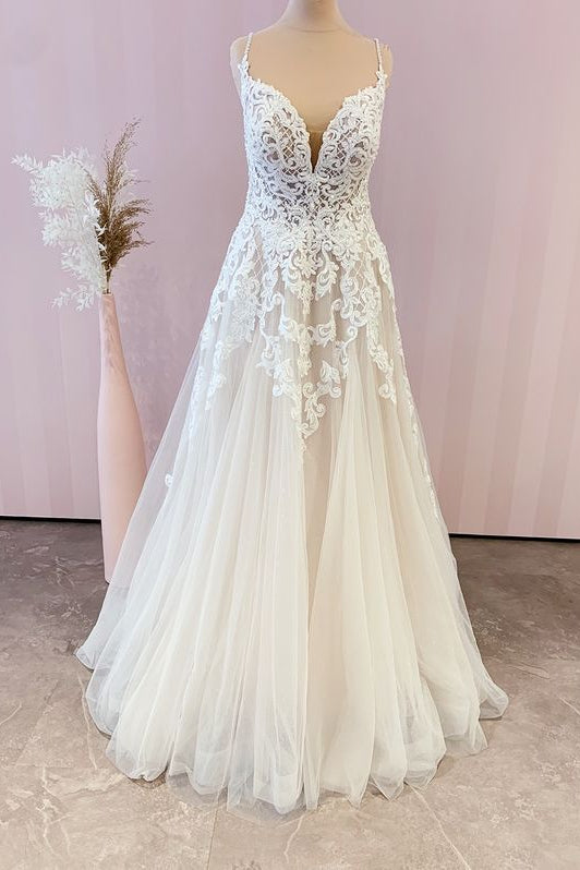 Elegant A-Line Wedding Gown with Spaghetti Straps, Tulle Skirt, and Lace Appliques