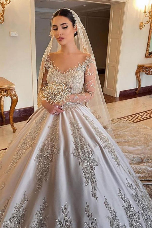 Elegant Sweetheart Pearl Wedding Dress with Long Sleeves in Satin and Beadings