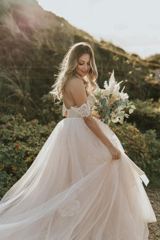 Elegant Off-the-Shoulder A-Line Wedding Gown with Lace Appliques and Tulle