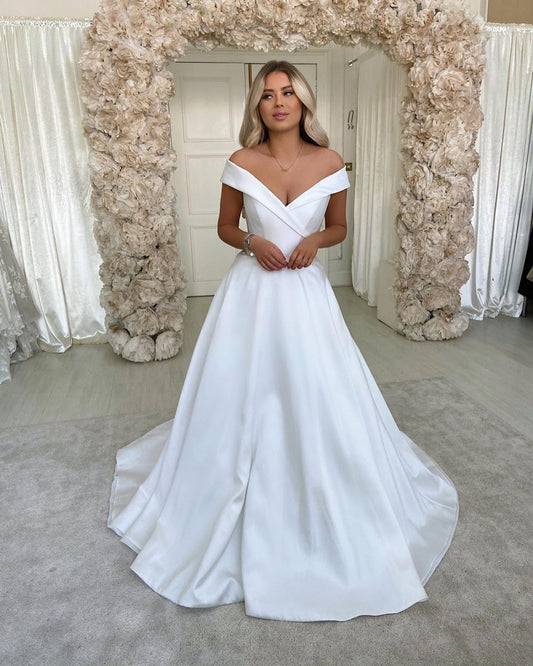 Elegant A-line Satin Wedding Dress with Sweetheart Backless and Off-the-Shoulder Design