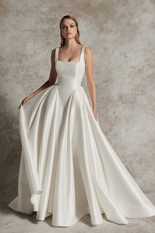 Elegant Ivory Satin A-Line Long Wedding Gown with Spaghetti Straps and Pleated Detail