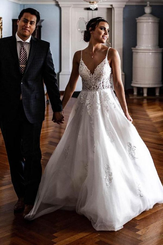 Elegant A-line Tulle Wedding Dress with Spaghetti Straps and Lace