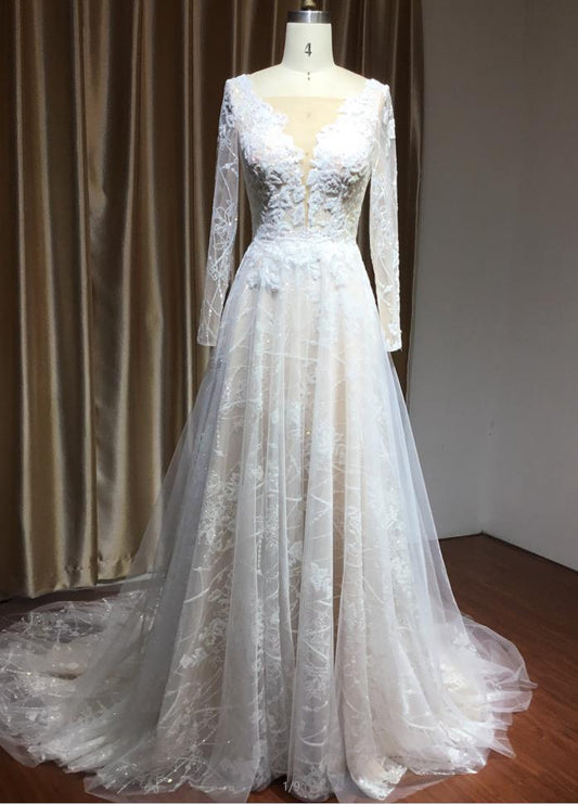 Elegant Long-Sleeve Illusion Wedding Gown in Sheer Tulle with Lace