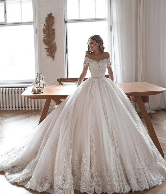 Elegant Long Sleeve Wedding Dresses in Lace and Tulle