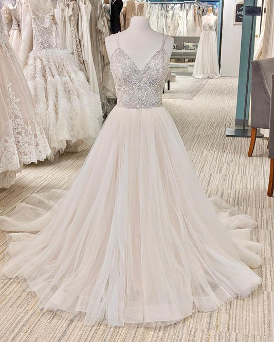 Elegant V-neck A-line Wedding Gown with Backless Design and Pearl Details