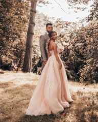 Elegant A-Line Wedding Gown with Chic Spaghetti Straps and Tulle Lace