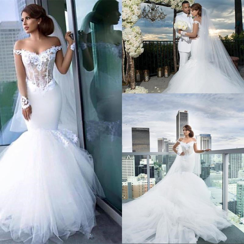 Wedding Dress With Lace Appliques in a Mermaid Off-the-Shoulder Style