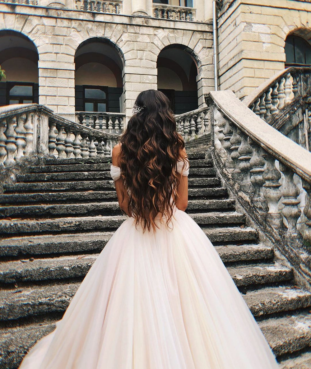 Elegant A-line Long Tulle Wedding Gown with Off-the-shoulder Neckline and Chapel Train