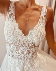 Elegant Backless A-Line Wedding Dress with Deep V-Neck and Lace Appliques