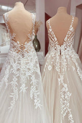 Elegant Floor-length A-Line Wedding Dress in Deep V-neck with Lace and Tulle Appliques