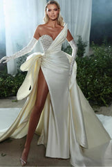 Elegant Ivory Satin Beaded Strapless Wedding Gown with Gloves and Side Split