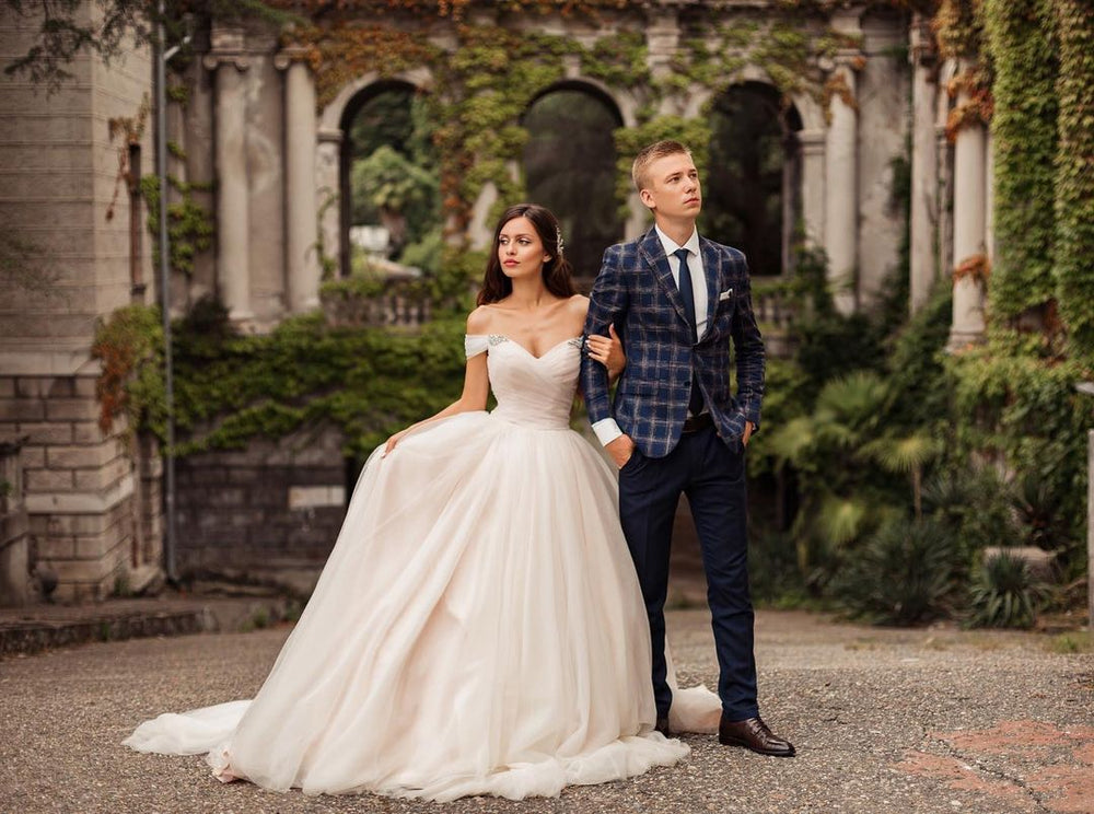 Elegant A-line Long Tulle Wedding Gown with Off-the-shoulder Neckline and Chapel Train