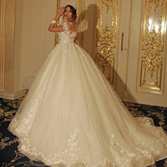 Sweetheart Wedding Dress with Romantic Long Sleeves and Floor-length Tulle Lace Appliques