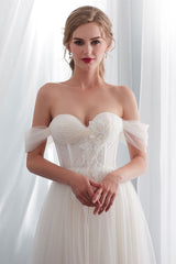 Elegant Long Tulle Wedding Dress with Off-the-Shoulder Design