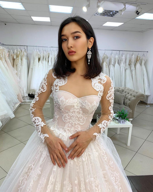 Sweetheart Backless Lace Wedding Dress with Long Sleeves and Tulle Appliques