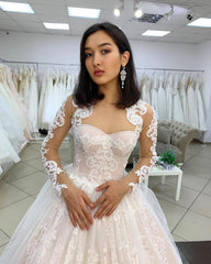 Sweetheart Backless Lace Wedding Dress with Long Sleeves and Tulle Appliques