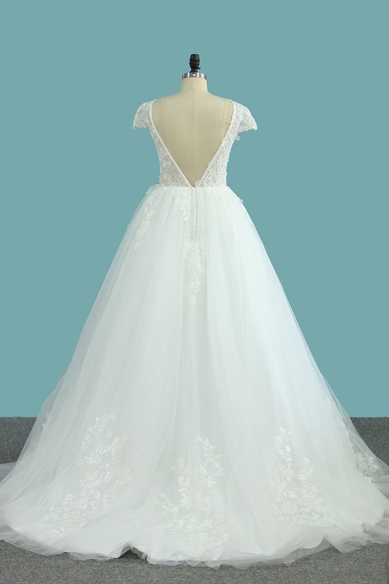 Elegant Floor-length Bateau Wedding Dress with Backless Lace and Tulle Appliques in an A-Line Silhouette