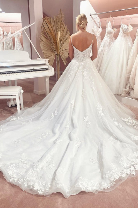 Elegant Strapless A-line Wedding Gown with Spaghetti Straps and Lace Appliques