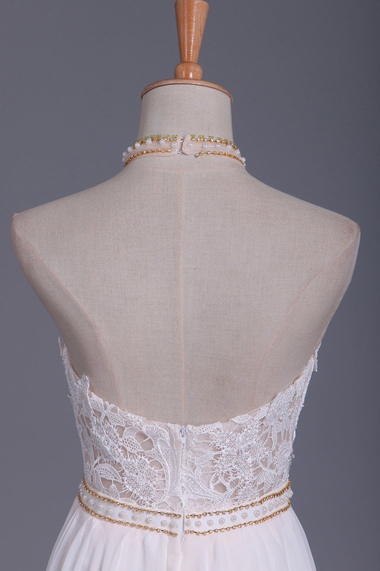 Elegant Halter Wedding Gown in Chiffon with Backless Design and Pearl Lace Ruffles