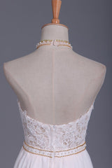 Elegant Halter Wedding Gown in Chiffon with Backless Design and Pearl Lace Ruffles