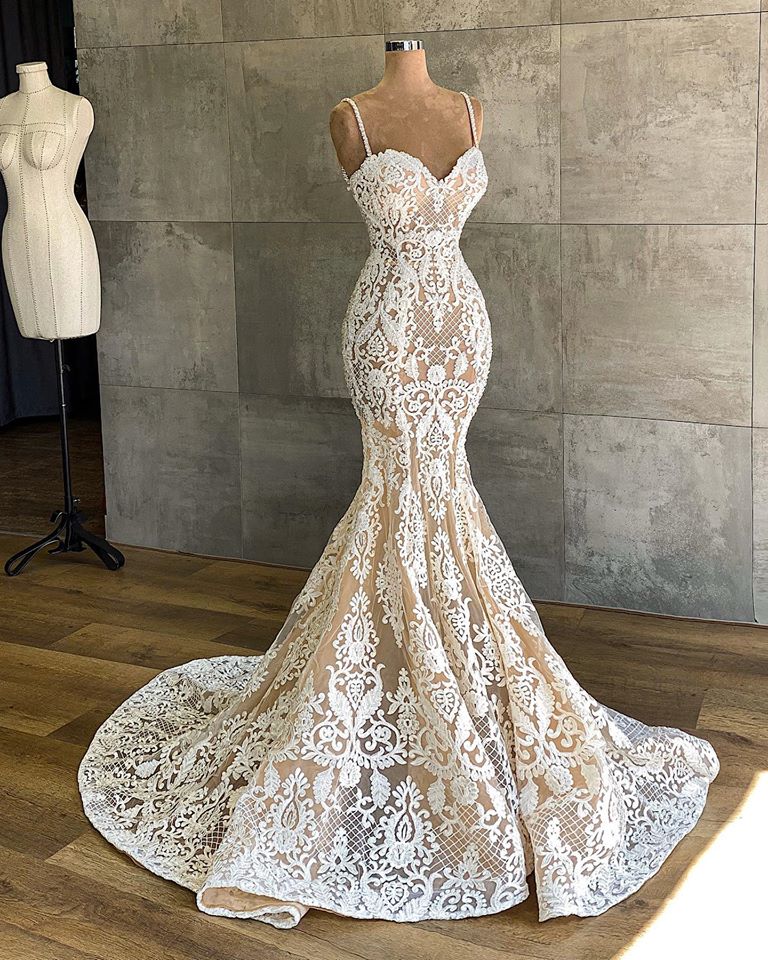 Elegant Sweetheart Mermaid Wedding Gown with Spaghetti Straps and Lace Appliques