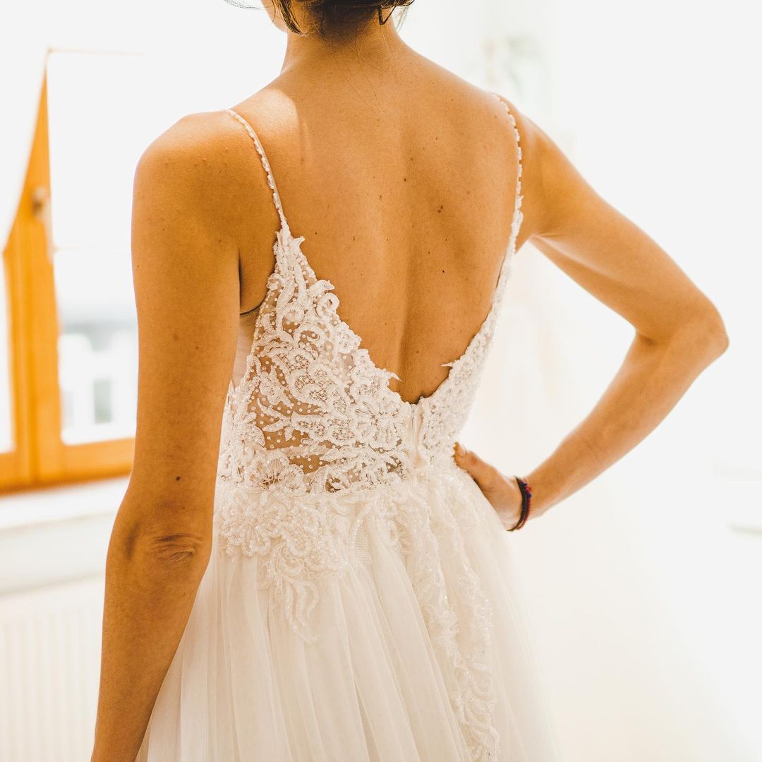 Elegant A-line Wedding Gown with Long Spaghetti Straps and Tulle