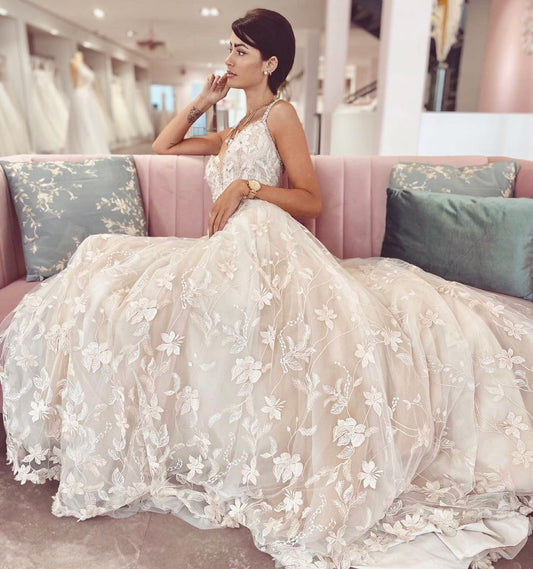 A-Line Wedding Dress with Elegant V-neck, Spaghetti Straps, and Appliques Lace Tulle