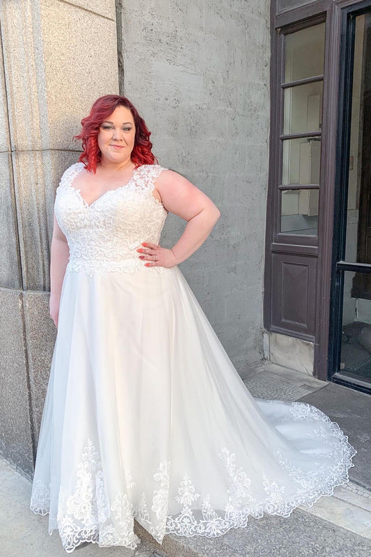 Elegant A-Line V-Neck Wedding Gown with Wide Straps and Lace Appliques