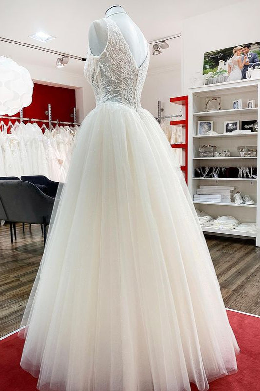 Elegant Ivory Princess Wedding Dress with V-neck, Long Ruffles, and Tulle Lace