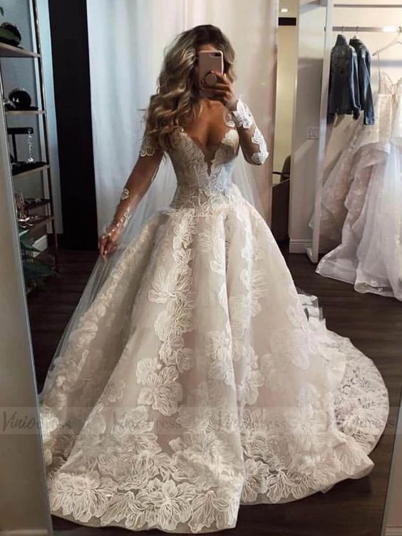 Elegant Pearl-Embellished Floor-Length A-Line Wedding Gown with Deep V-Neck and Lace Appliques