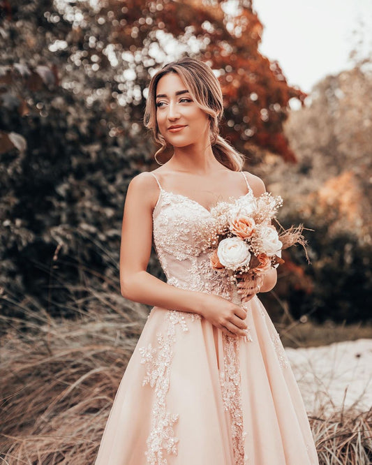 Elegant A-Line Wedding Gown with Chic Spaghetti Straps and Tulle Lace