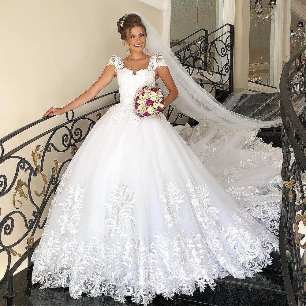 Elegant Princess Wedding Dress with Cap Sleeves and Tulle Lace