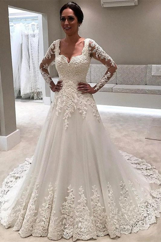 Wedding Dress with Lace Appliques and Long Sleeves in an A-Line Cut