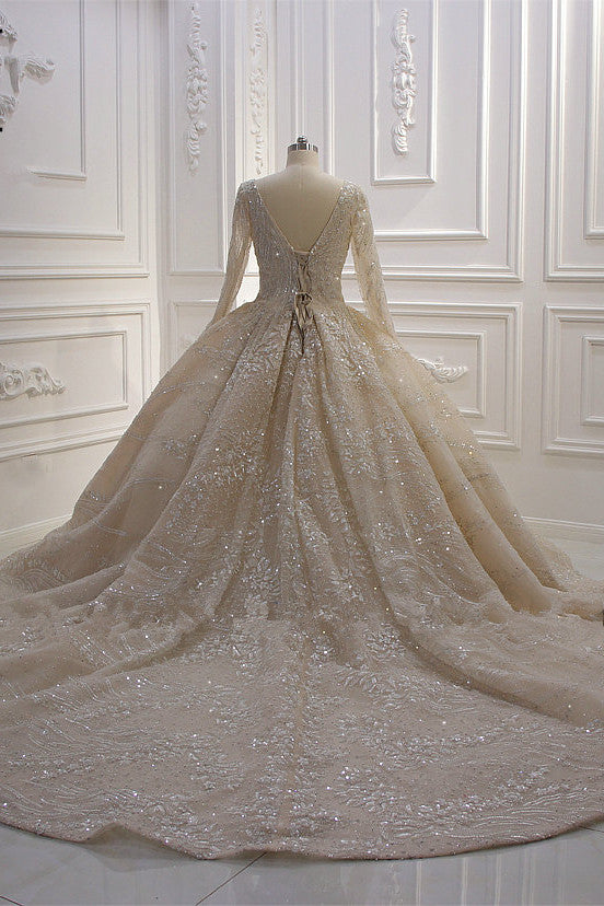 Elegant V-neck Ball Gown with Long Sleeves, Sequins, Beading, and Ruffles