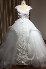 Elegant Cap Sleeve Wedding Gown with Floral Appliques and Jewel Accents
