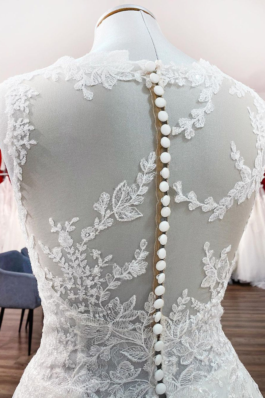 Elegant A-line Jewel Tulle Wedding Gown Featuring Lace Appliques