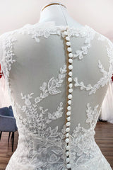 Elegant A-line Jewel Tulle Wedding Gown Featuring Lace Appliques