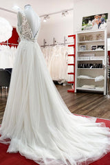Elegant Backless Long A-line Wedding Dress with V-neck, Tulle Ruffles, and Lace