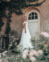 Elegant Off-the-shoulder 3D Floral A-line Wedding Dress with Lace Appliques