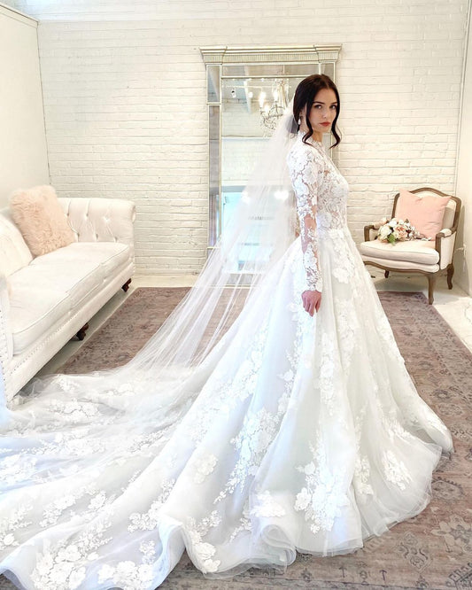 Elegant High Neck A-line Wedding Gown Featuring Lace Sleeves and Open Back