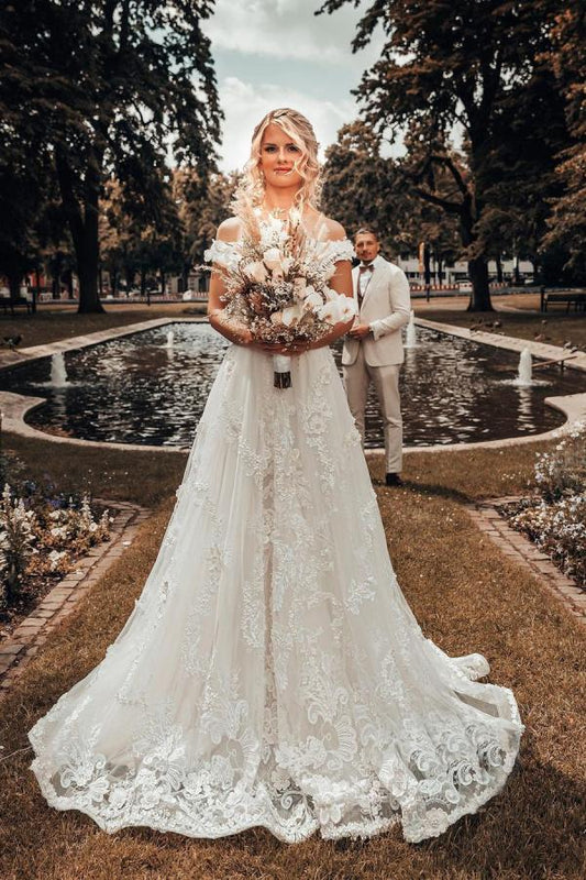 Elegant Off-the-shoulder 3D Floral A-line Wedding Dress with Lace Appliques
