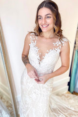 Elegant Floor-length Mermaid Wedding Dress with Unique Lace Appliques